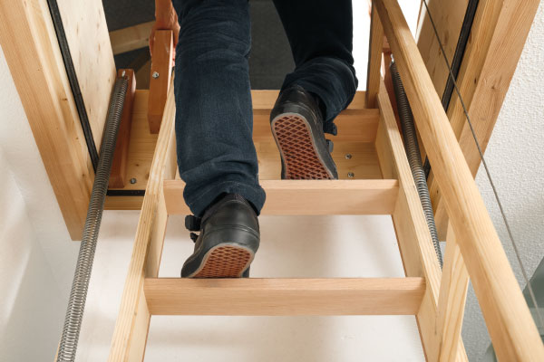 Stairs leading to an attic in the ceiling